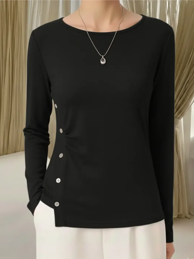 Mila – Gebreide top met subtiele knoopdetails