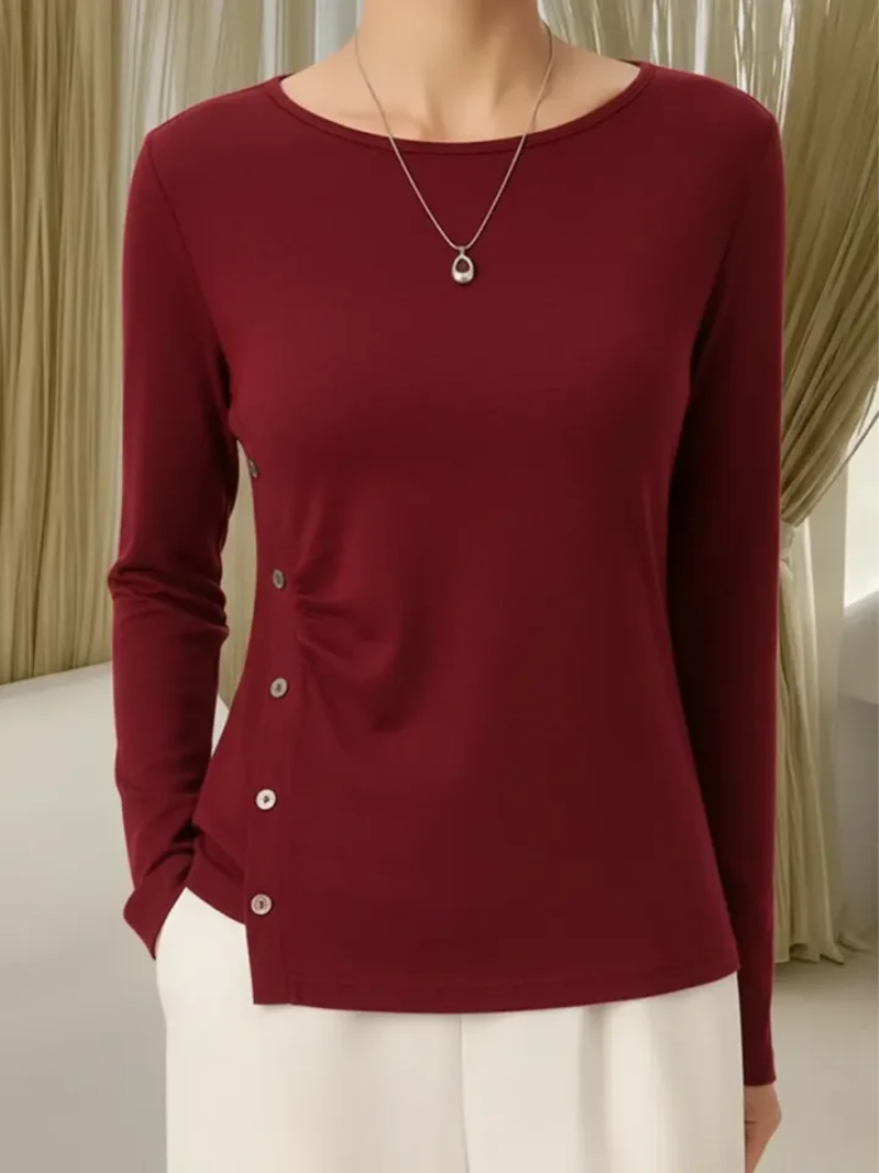 Mila – Gebreide top met subtiele knoopdetails